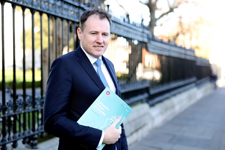 Minister for Agriculture, Food and the Marine, Charlie McConalogue TD with the latest Ireland’s Ocean Economy Report, a  partnership with the Marine Institute and the University of Galway’s Socio-Economic Marine Research Unit (SEMRU).