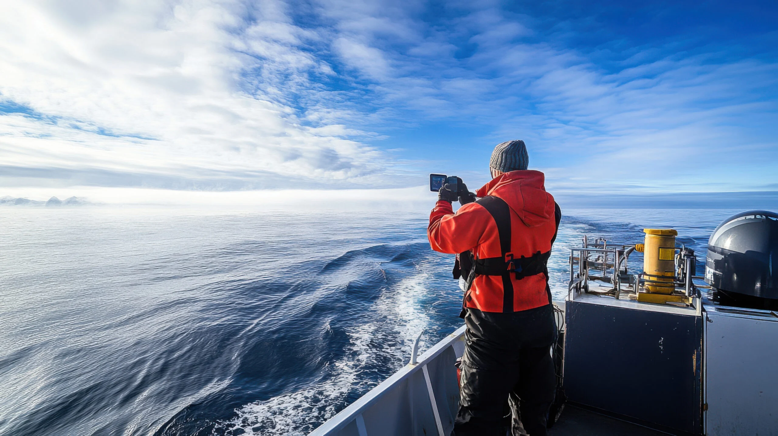 Marine researchers working on a vessel deck